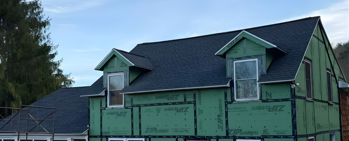Professional residential roofing installation in Albany, NY, featuring high-quality architectural shingles and premium ZIP System weather barrier for maximum protection