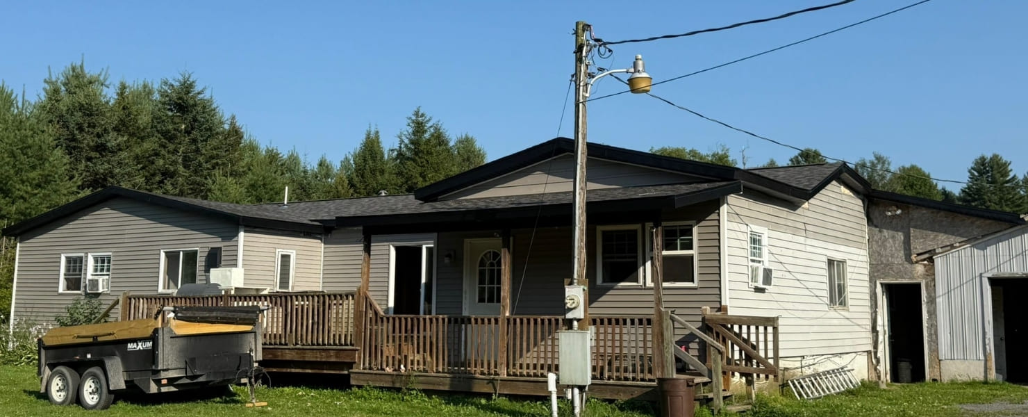 Professional residential roof replacement in Albany, NY, showcasing high-quality asphalt shingles and a clean, durable finish by MG Contractor NY